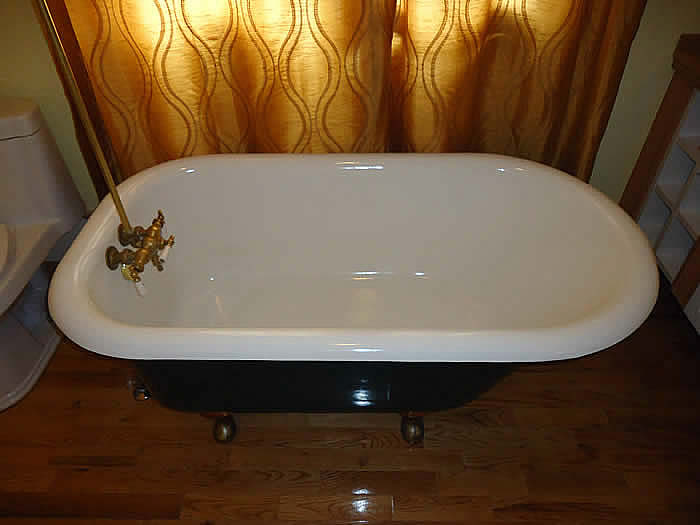 a beautiful antique bathtub refinished to look like new in Kelowna