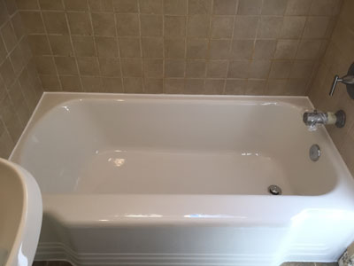 newly refinished beige bathtub and sink