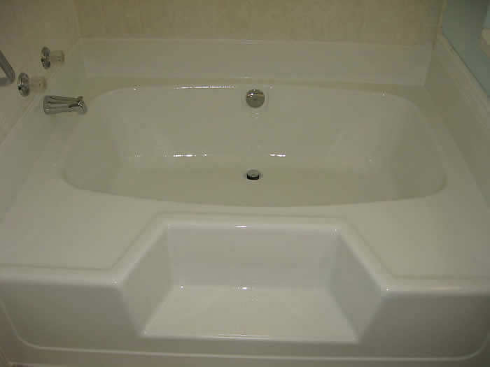 A step up bathtub completely refinished in Kelowna using Surebond