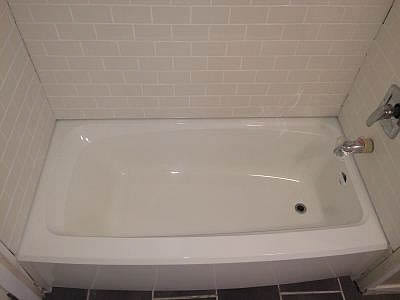unusually shaped bathtub refinished