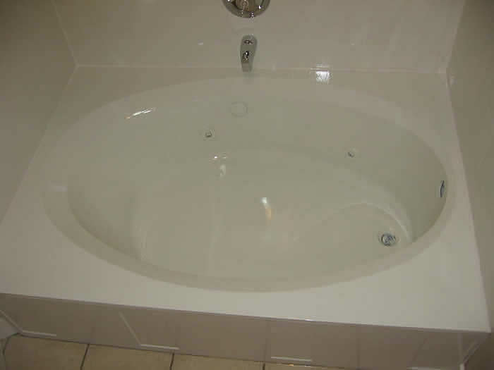 a very unique round bathtub refinished to look new. Worth the work.